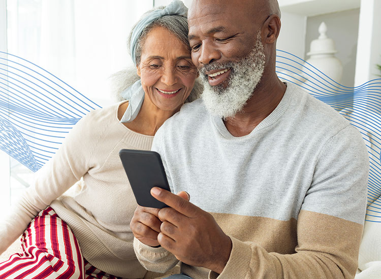 Healthy Couple Looking at Phone